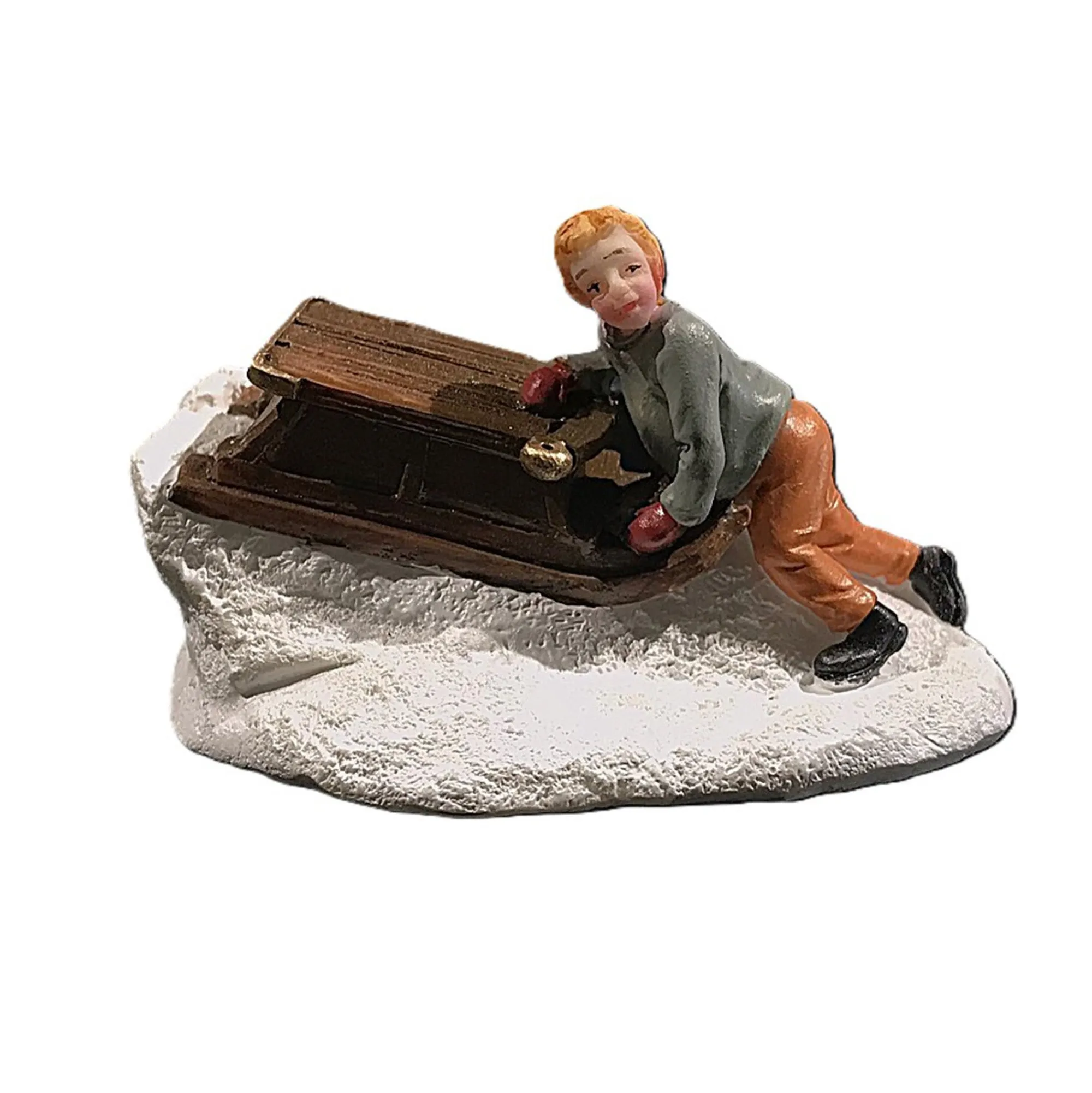 Kerstdorp<Kerstdorp jongen met slee