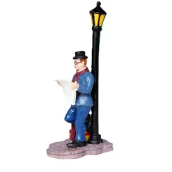 Kerstdorp<Kerstdorp krant lezen