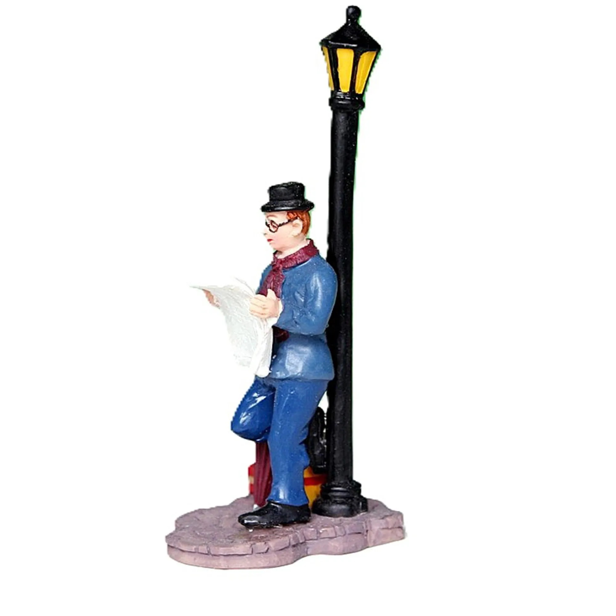 Kerstdorp<Kerstdorp krant lezen